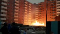 В Иркутске во время сильного ветра 9 мая загорелась строящаяся подземная парковка