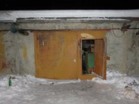 Тела трех застреленных мужчин обнаружили в одном из гаражей Усть-Илимска